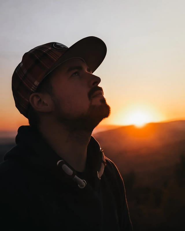 Timo Prüße at golden hour on a California coastline, warm light on his face